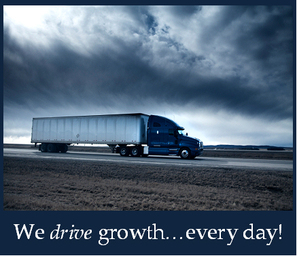 Image of long haul truck moving down the highway at dusk with words 