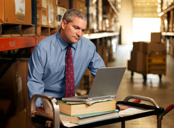 Image of warehouse customer at his computer