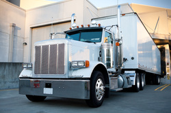 Image of long haul truck at a loading dock